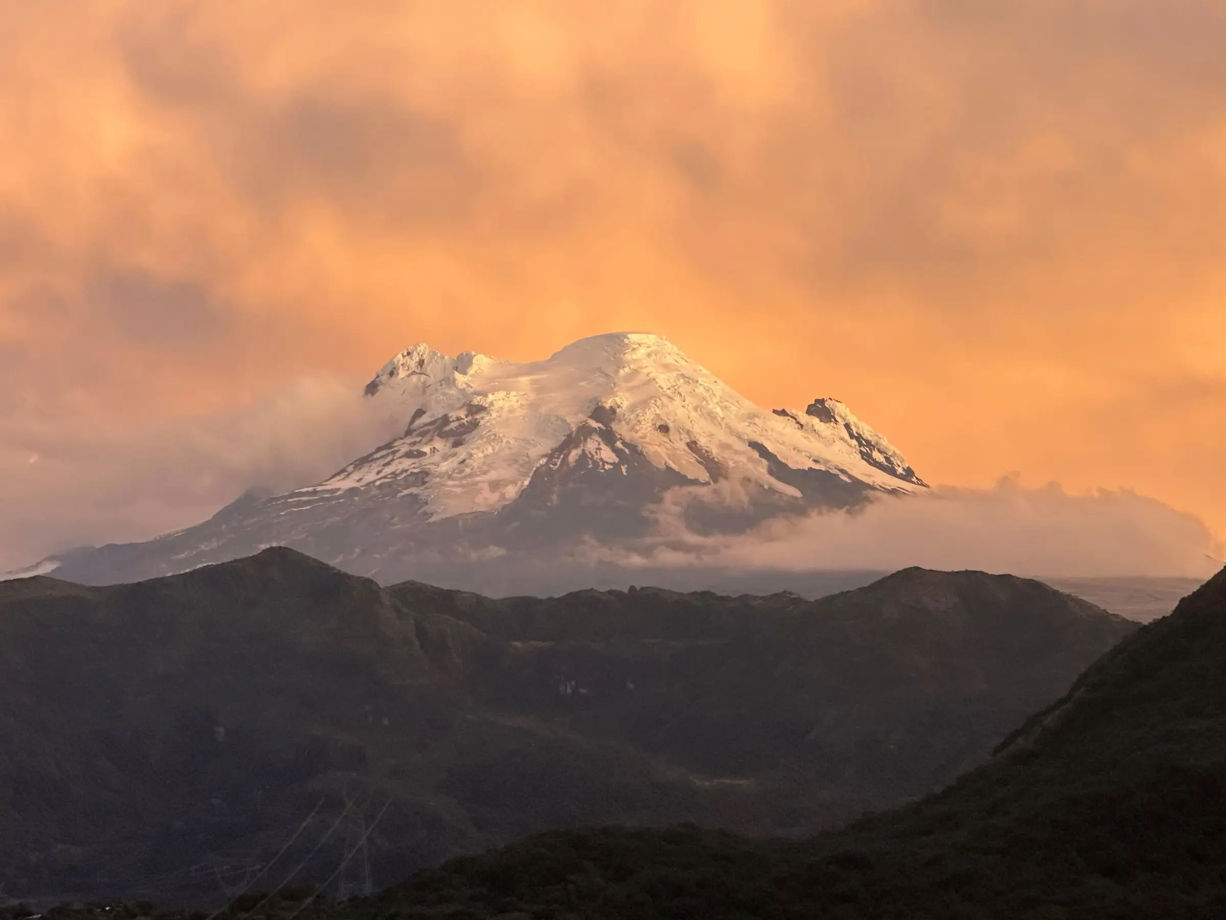 Quito to Papallacta road views: Antisana glowing at sunset above the páramo near the Papallacta pass